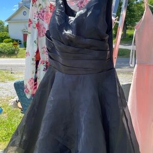 Retro dress, brand new w/ tags. Hits right at knees. Super cool, unique & pretty